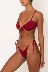 red v-cut bikini bottom on body side view