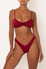 high waisted bikini bottoms in red on body