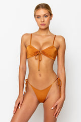 Sommer Swim model facing forwards and wearing a Cara brazilian bikini bottom in Papagayo